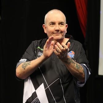 Phil 'The Power' Taylor celebrating