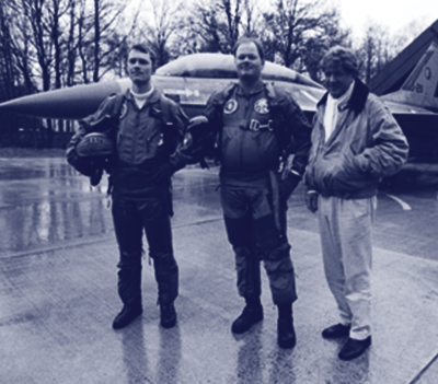Raymond van Barneveld standing alongside two Dutch pilots infront of the F-16 plane he had the opportunity to ride in.