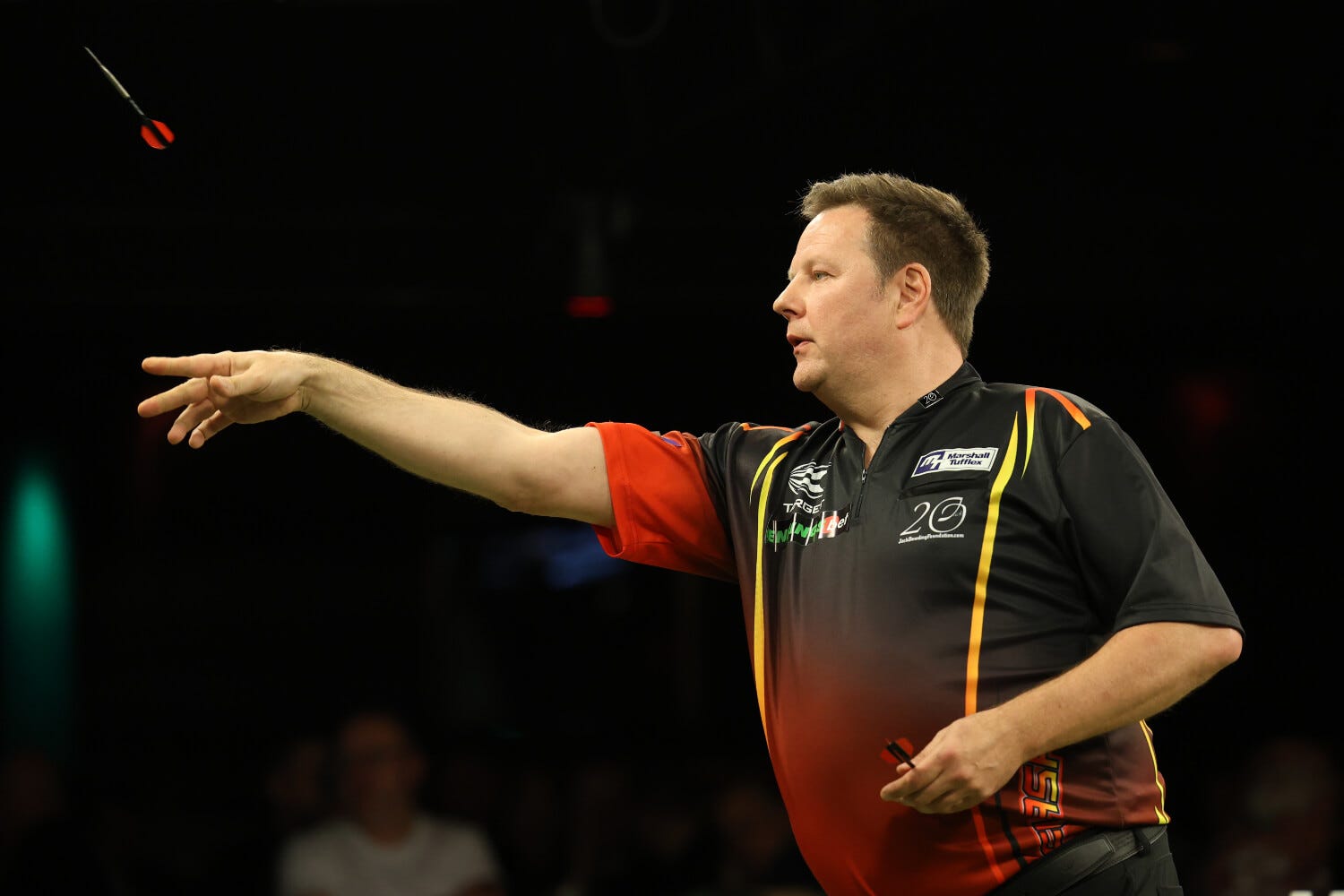 Mark Dudbridge throwing a dart