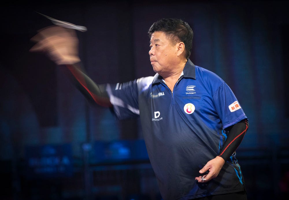 Paul Lim representing Target whilst throwing a dart