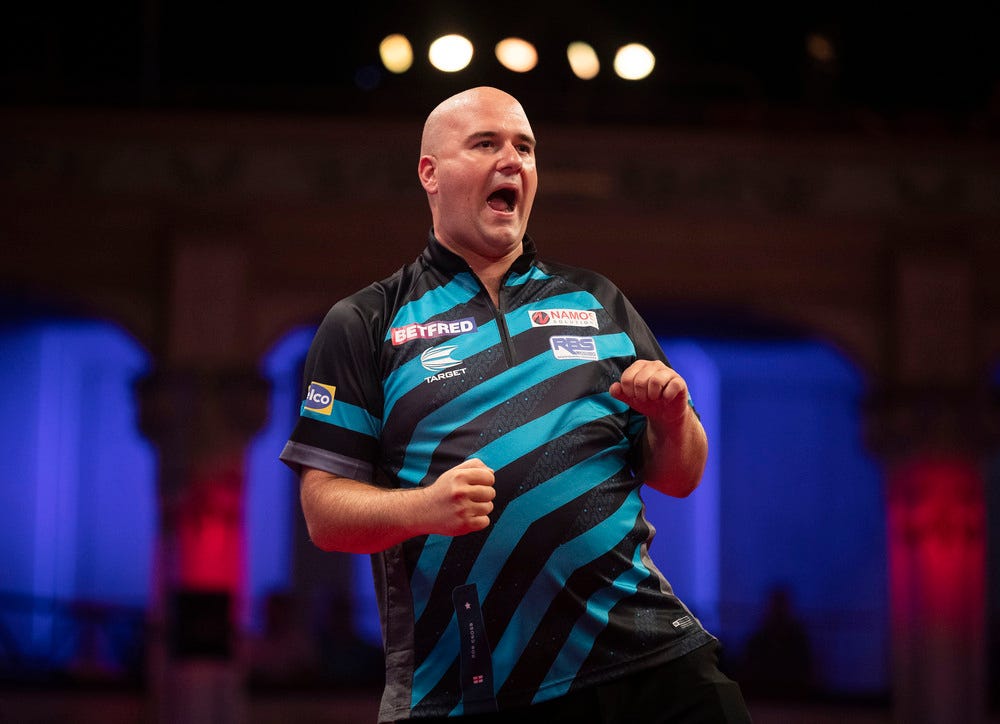 Rob Cross celebrating winning the match