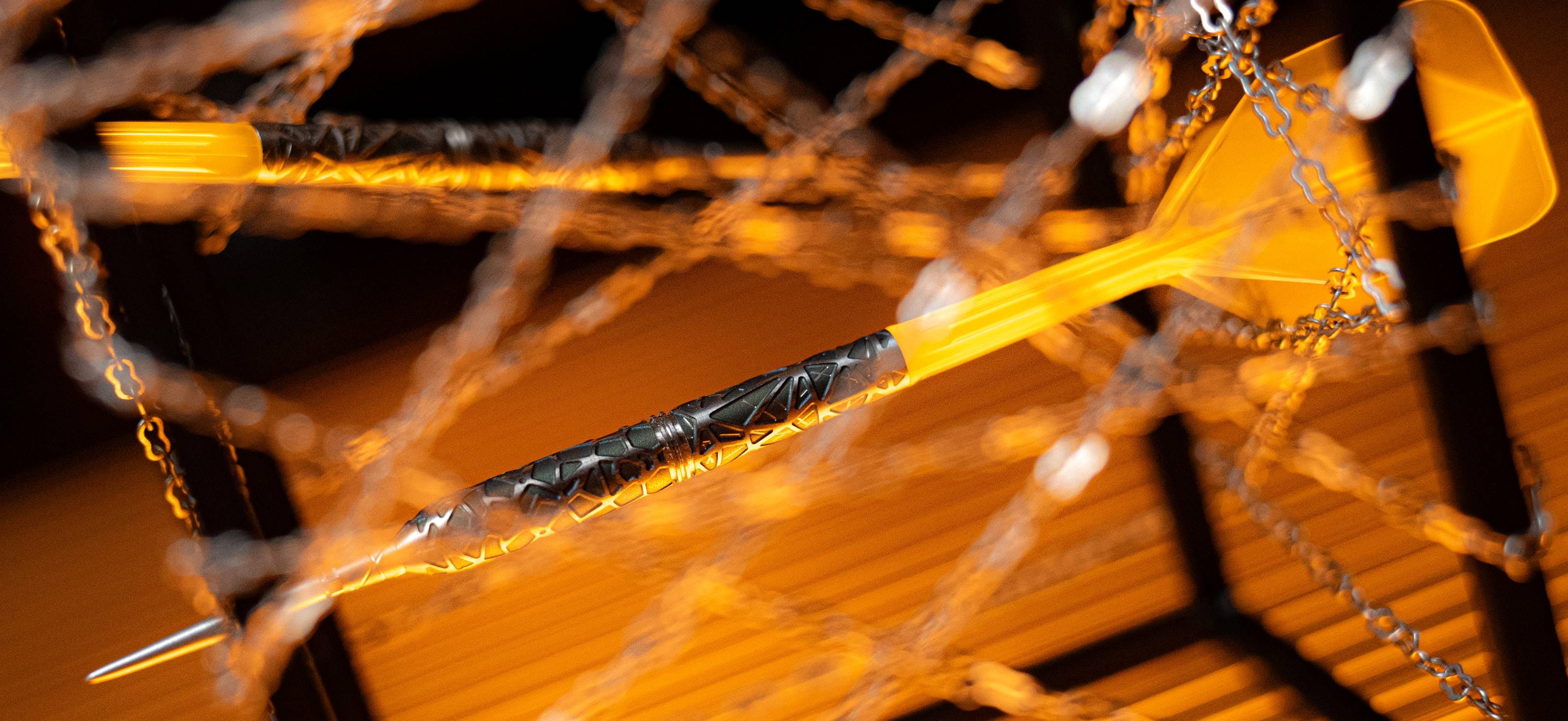 Full view of Elysian 10 Steel Tip Dart surrounded by chains