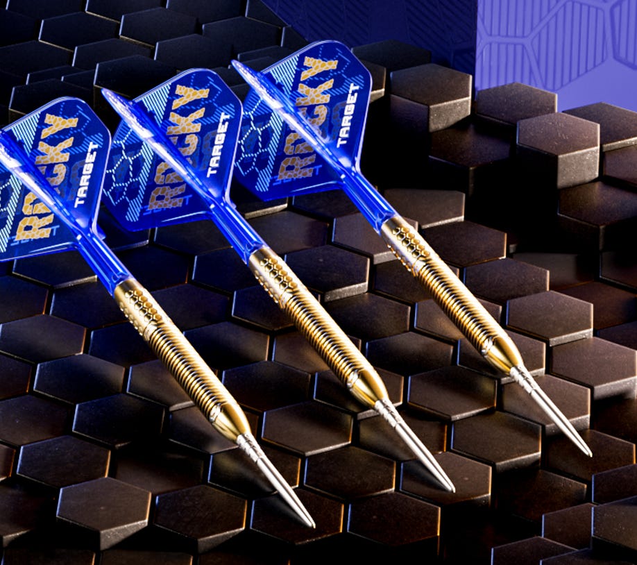 Josh Rock Limited Edition Swiss Point Darts laying on graphite background