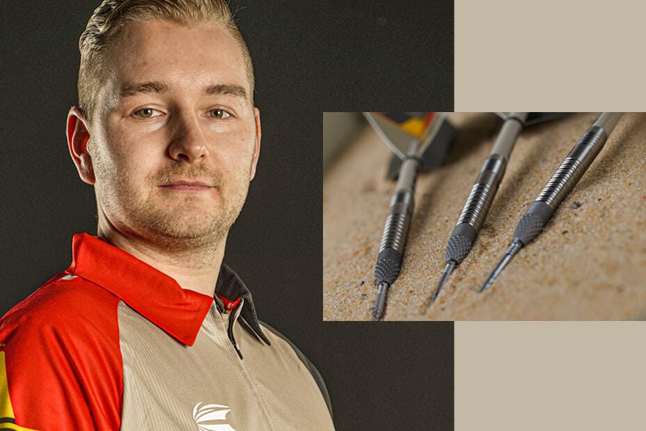 Dimitri Van den Bergh modelling his Generation 1 darts
