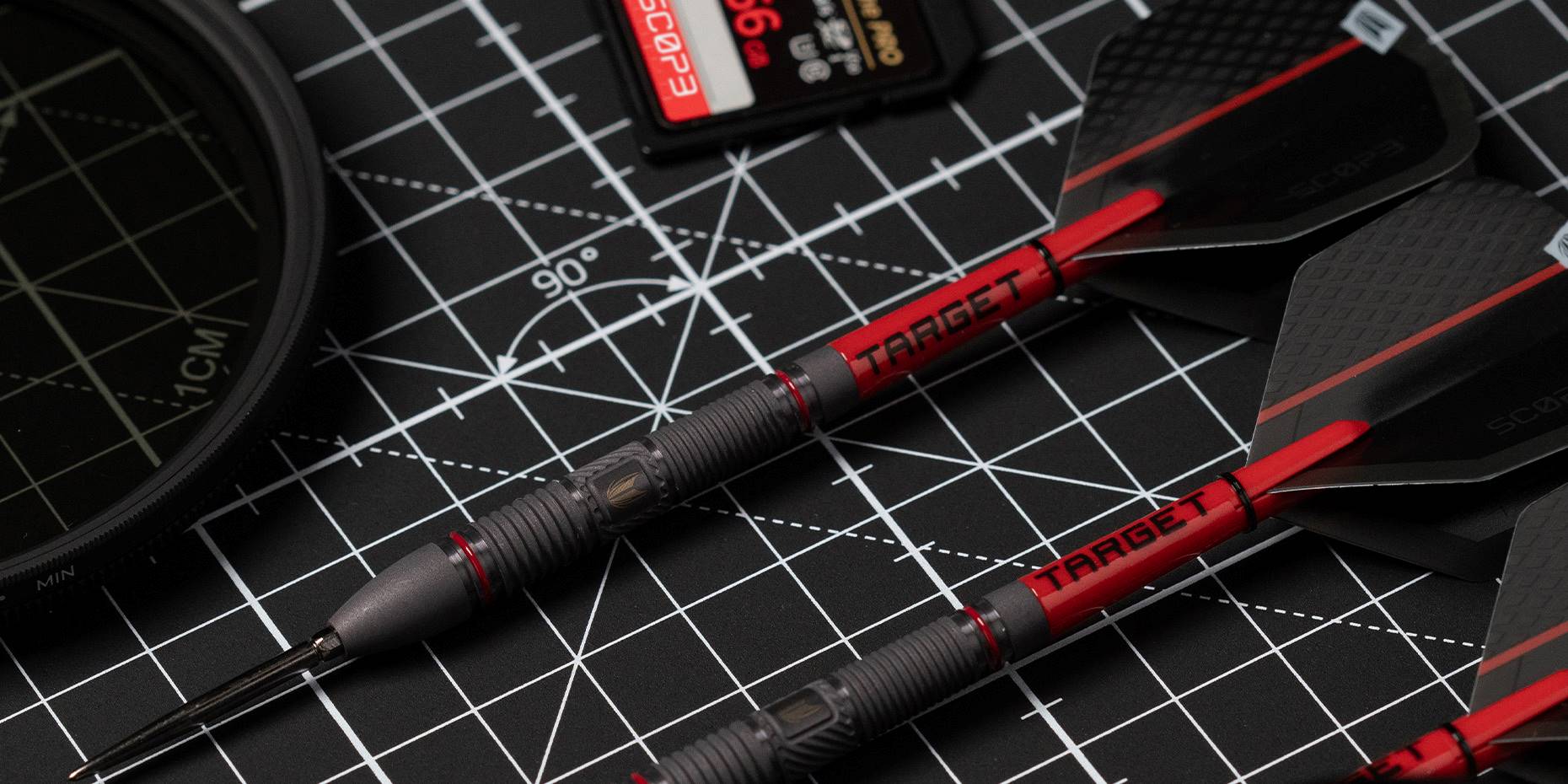Lifestyle shot of Scope darts lying down next to each other